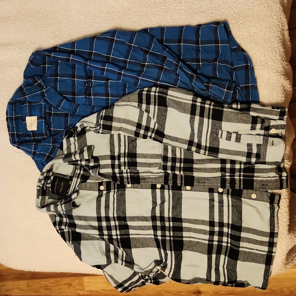Two (2) button down men's xl plaid collared shirts